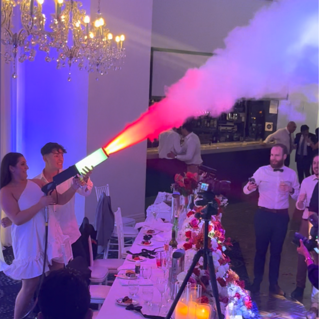 Couple using CO2 canon at their wedding